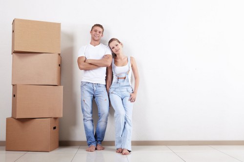 Moving team preparing a customer booking and inventory for a UK removal service