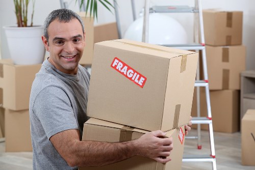 Staff assessing loading risks before a moving job