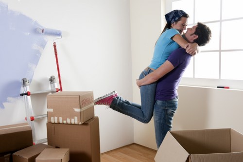 Furniture being carefully loaded for a flat move in West London